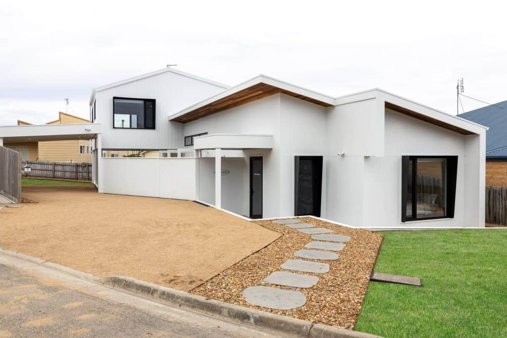 Architecturally designed custom split-level home with large north-facing windows in Apollo Bay